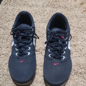 Nike Black and White Athletic Shoes with Red Detail